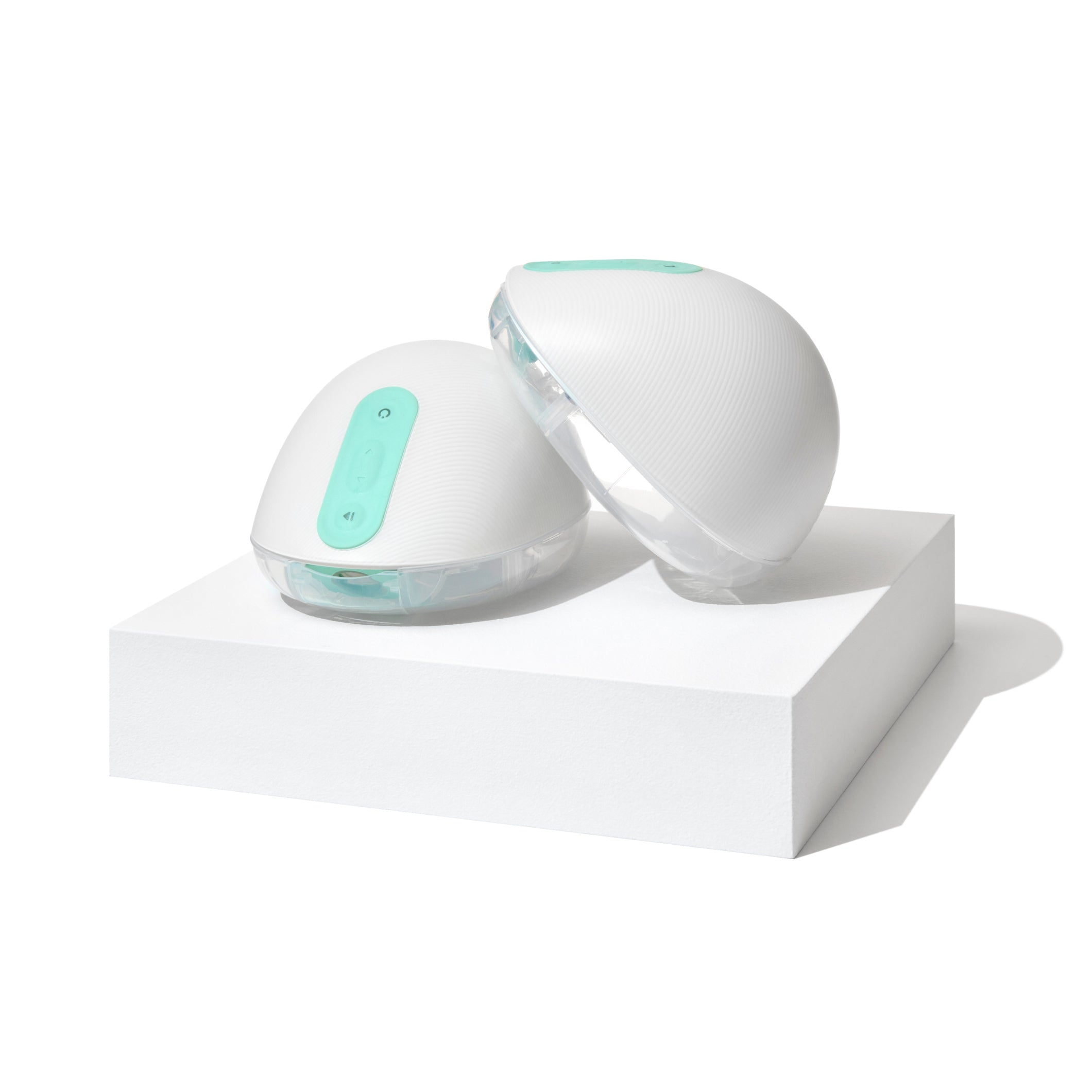 Willow 360 wearable breast pump in-bra with rounded white cups and teal accents